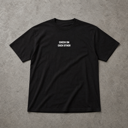 Black t-shirt with white text on a gray background
