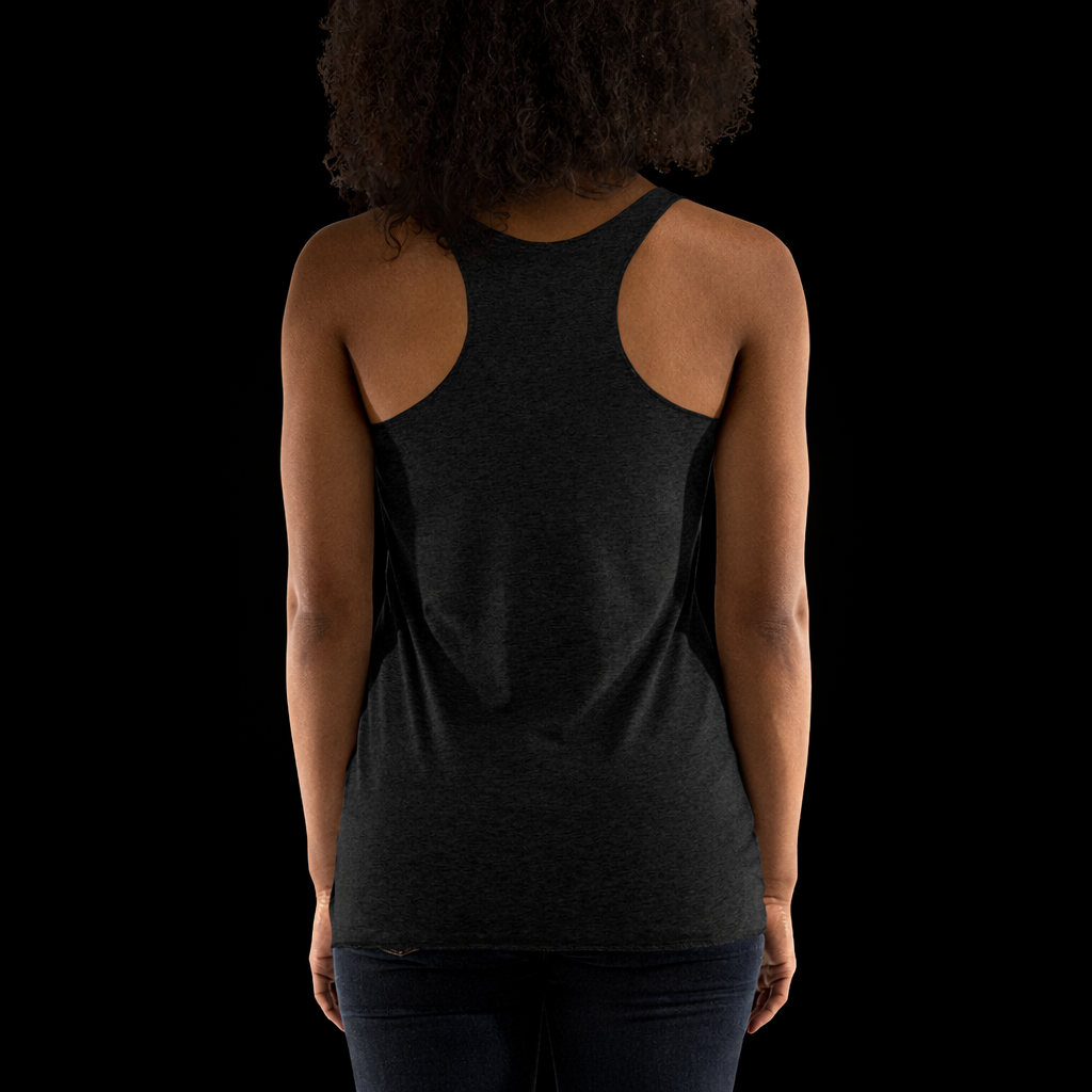 Person wearing a black tank top with a plain background