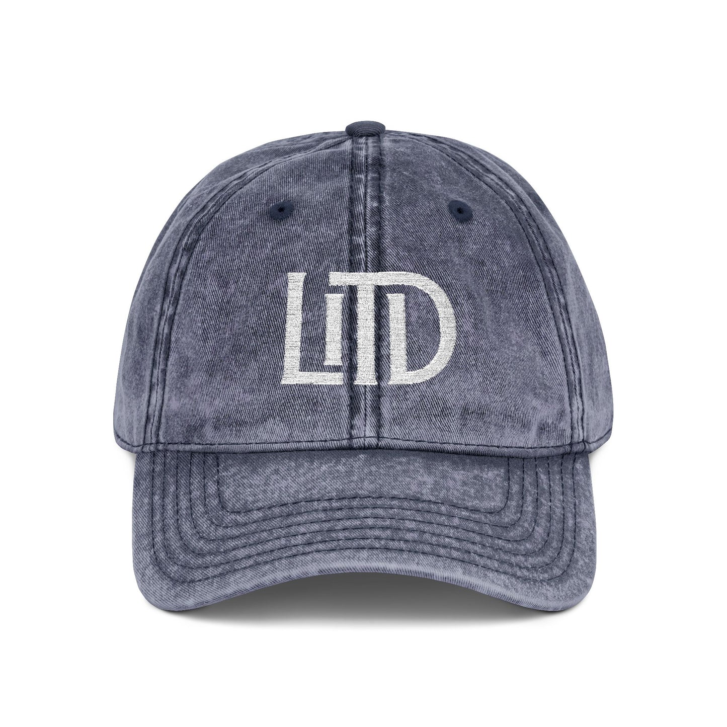 Blue denim cap with 'LTD' logo on a white background