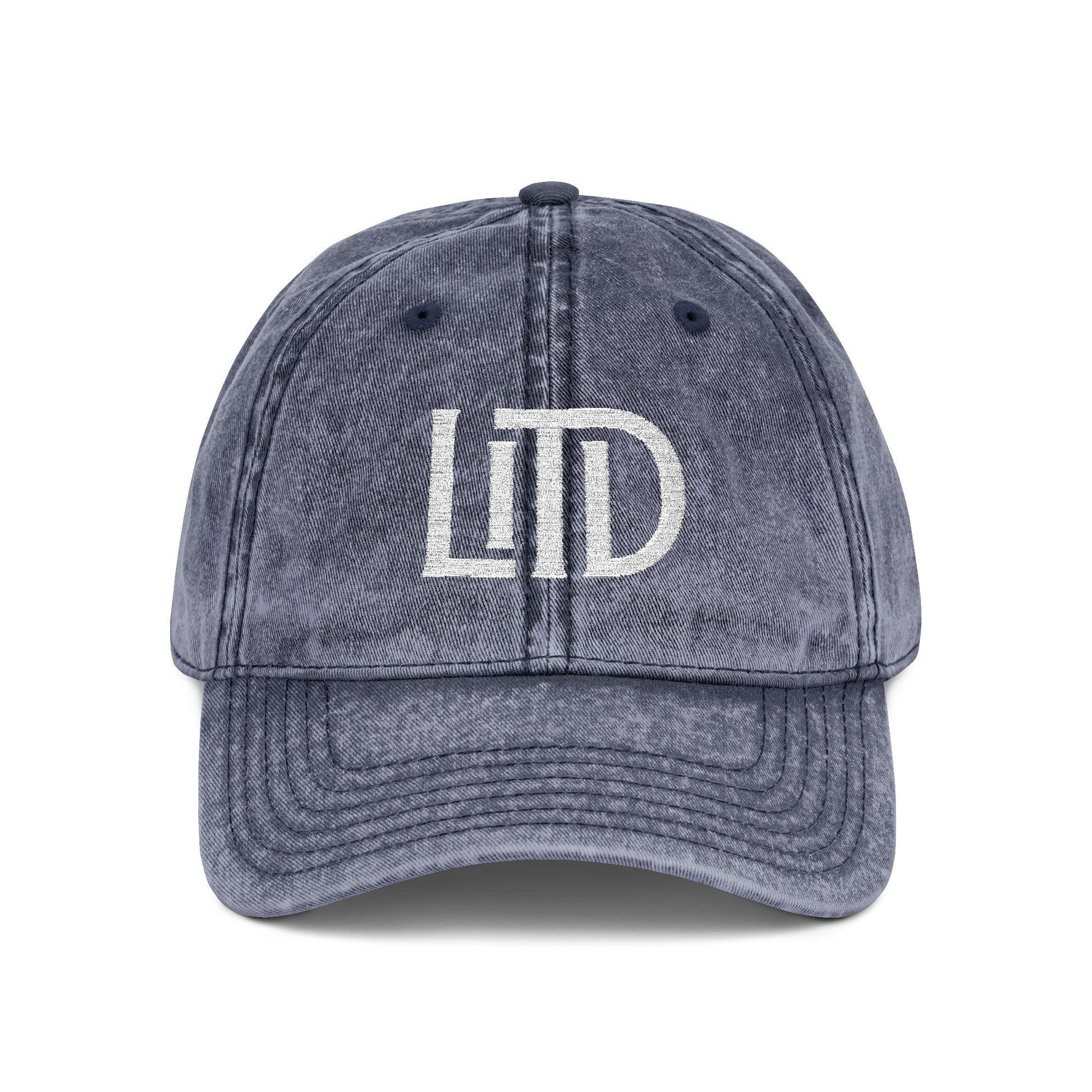 Blue denim cap with 'LTD' logo on a white background