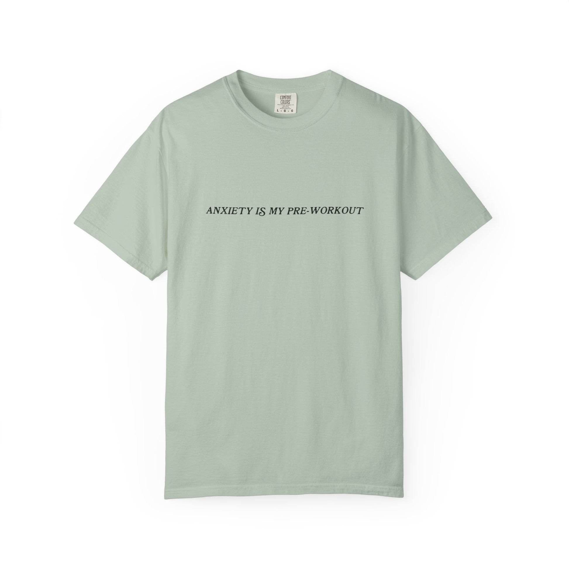Light green t-shirt with text 'ANXIETY IS MY PRE-WORKOUT' on a white background