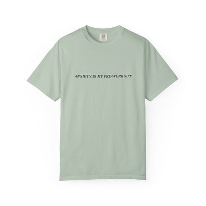 Light green t-shirt with text 'ANXIETY IS MY PRE-WORKOUT' on a white background