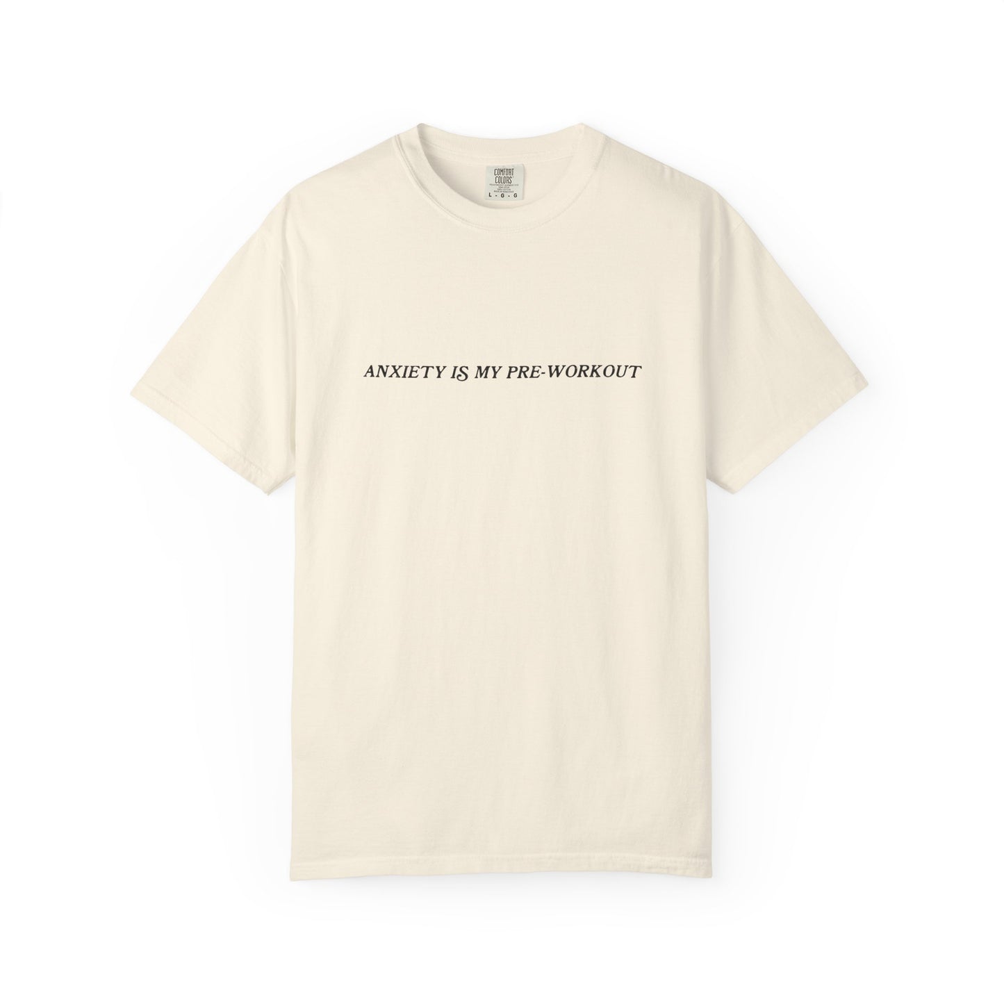 Beige t-shirt with text 'ANXIETY IS MY PRE-WORKOUT' on a white background