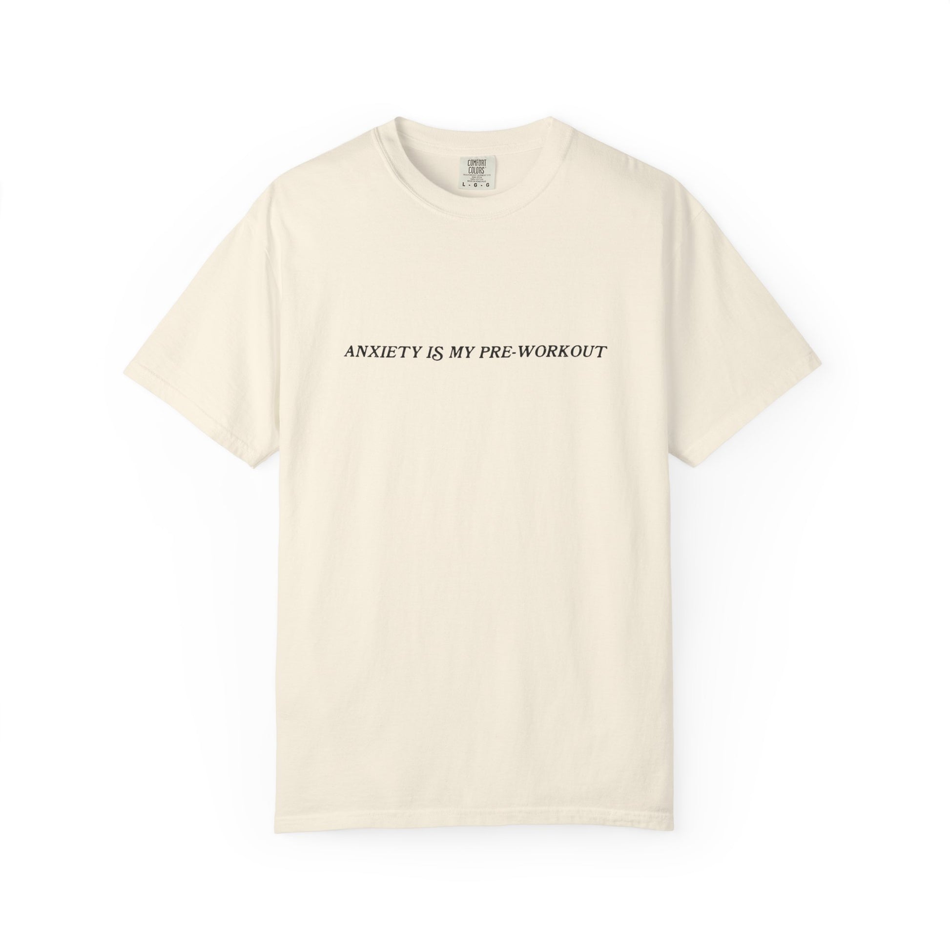 Beige t-shirt with text 'ANXIETY IS MY PRE-WORKOUT' on a white background