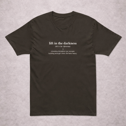 Black t-shirt with text on a gray background