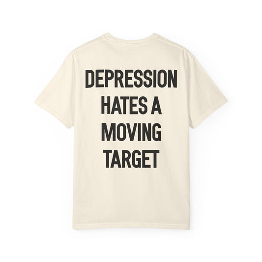 Beige t-shirt with black text on the back on a white background