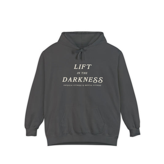 Dark gray hoodie with text 'Lift in the Darkness' on a white background
