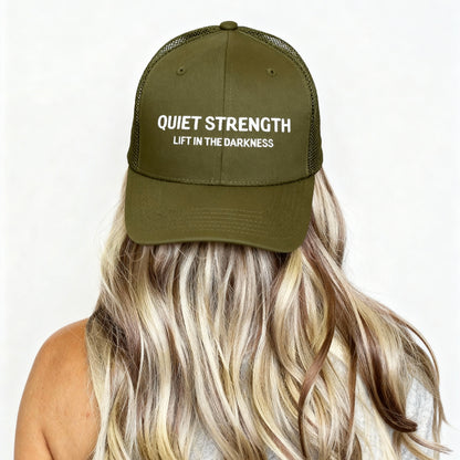 Green cap with 'Quiet Strength Lift in the Darkness' text on a white background