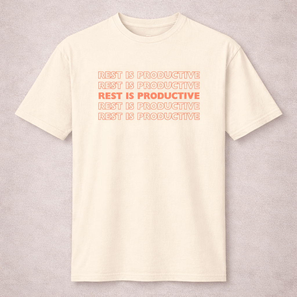 Beige t-shirt with 'REST IS PRODUCTIVE' text in red on a light gray background