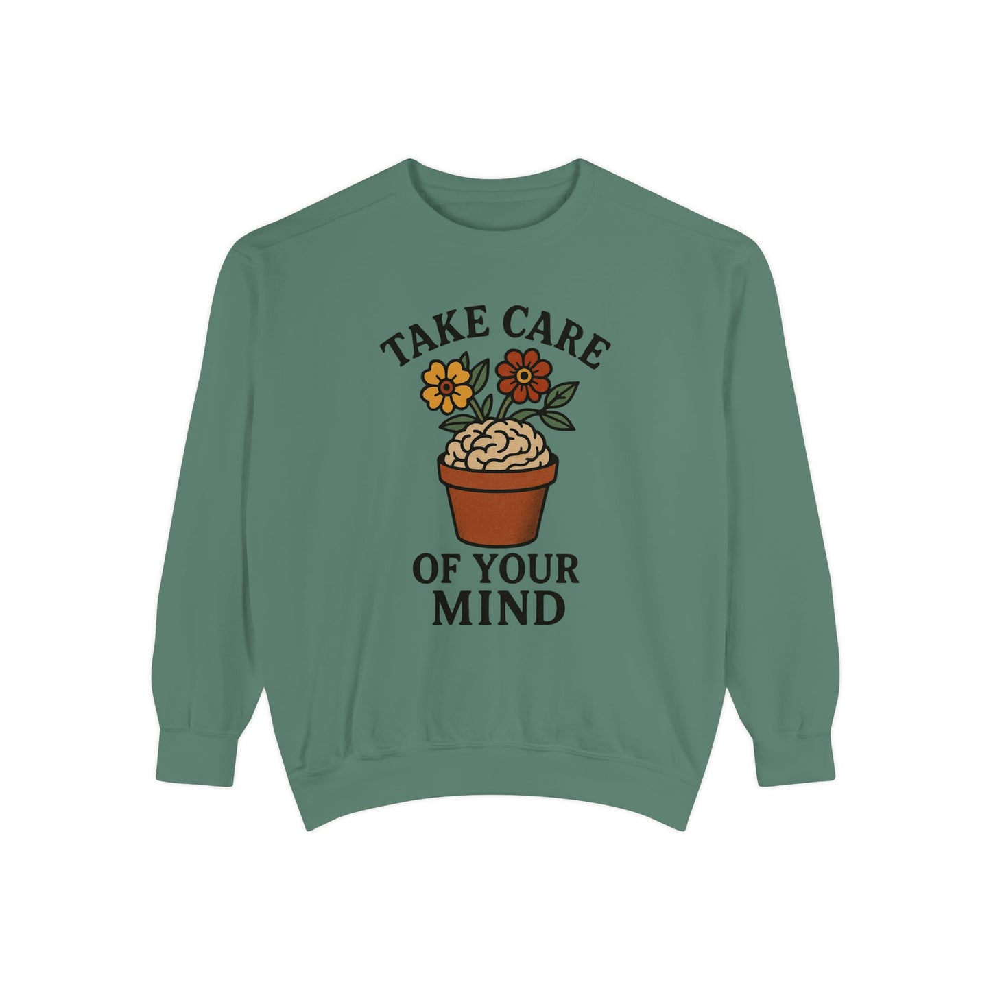 Green sweatshirt with 'Take care of your mind' and brain potted plant graphic on a white background