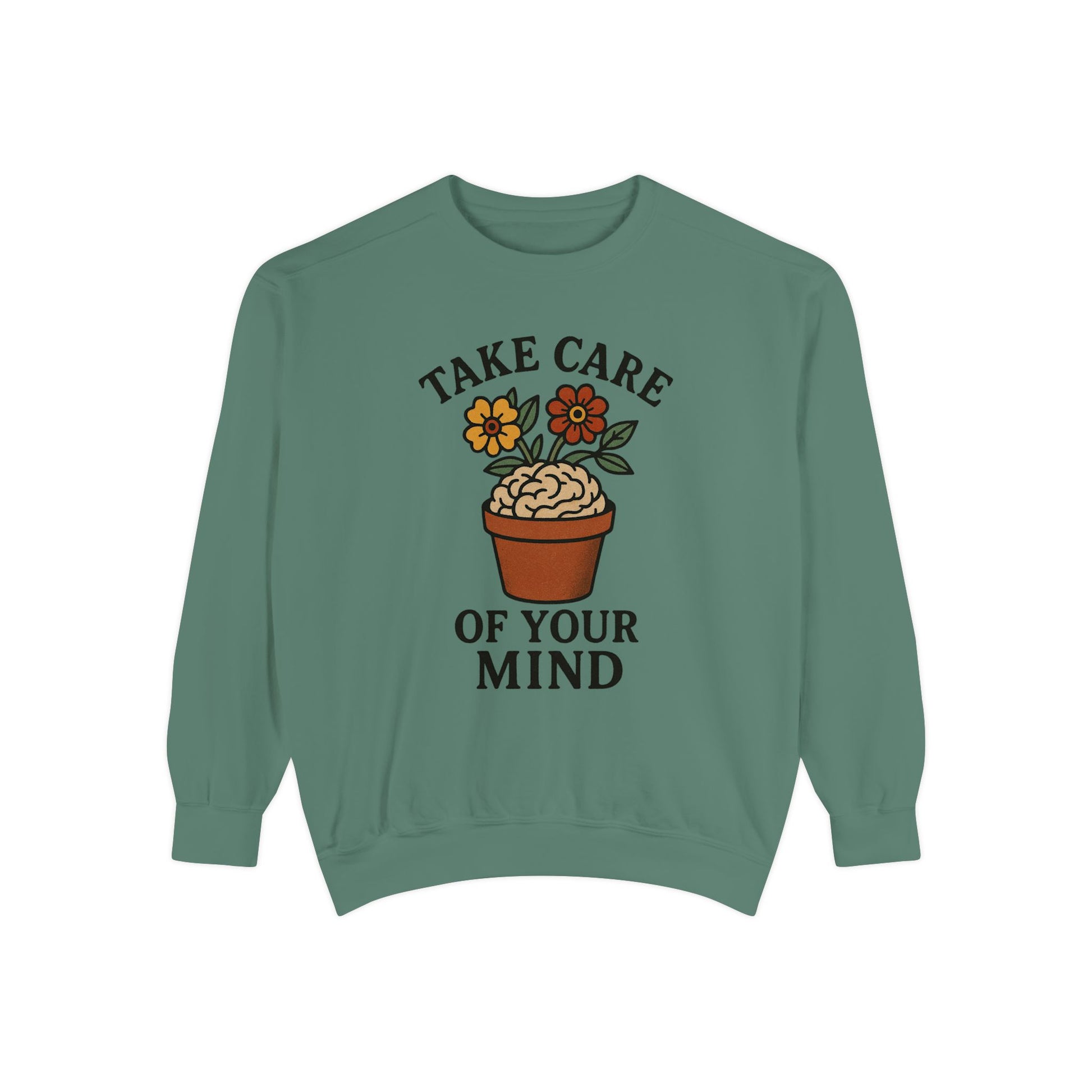 Green sweatshirt with 'Take care of your mind' and brain potted plant graphic on a white background
