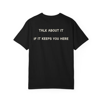 Black t-shirt with white text on a white background